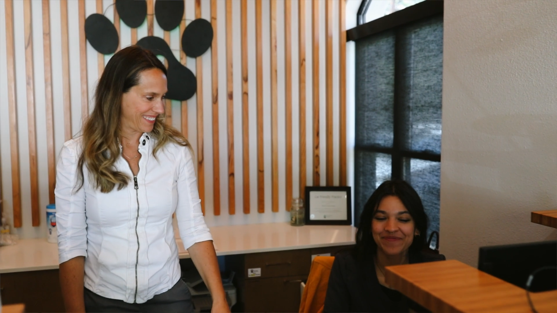 Dr. Shannon Mazur and associate at the front desk of the Riverview Animal Hospital in Durango, Colorado