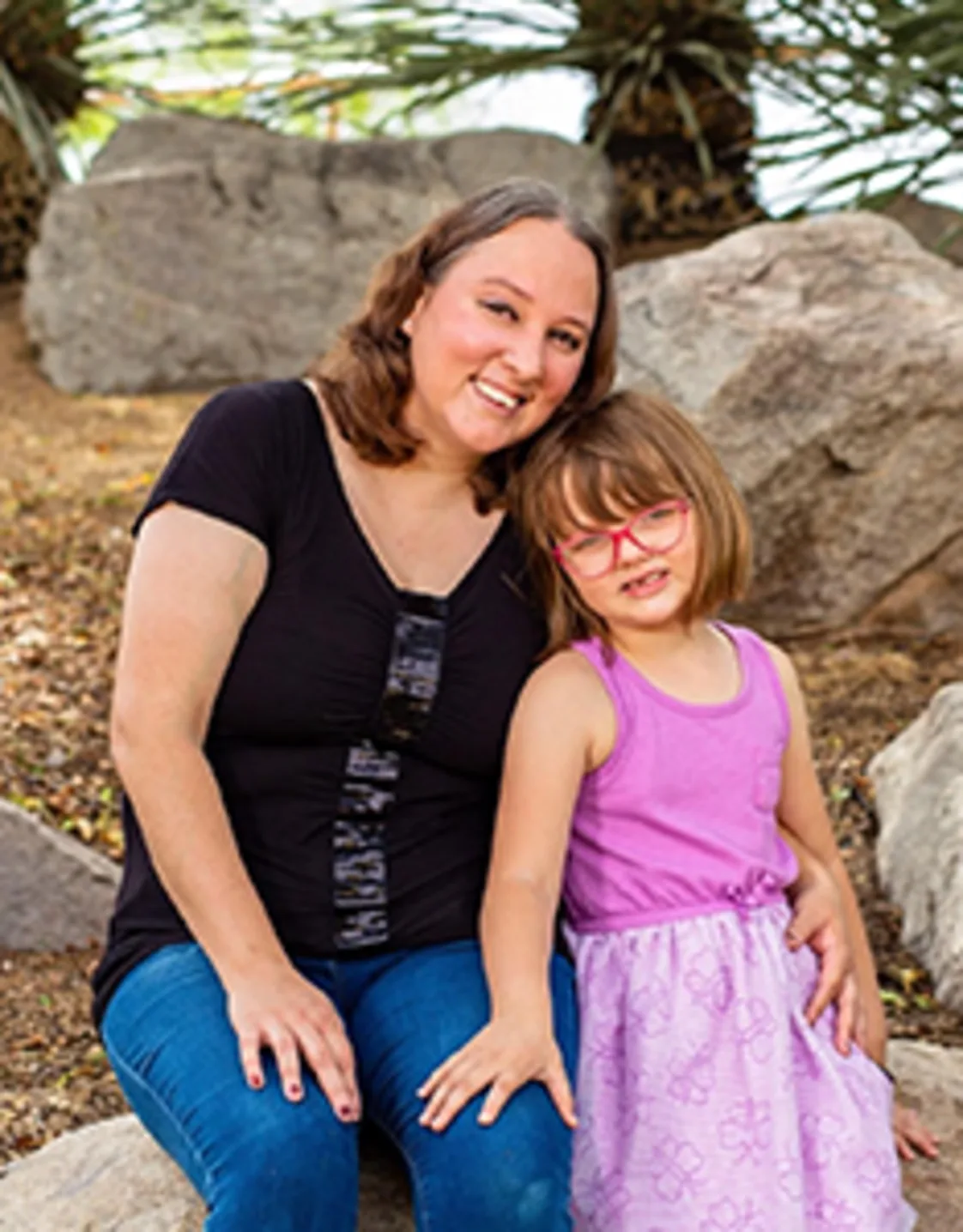 Kelly Guerrero with daughter in purple dress Kelly Guerrero with daughter in purple dress