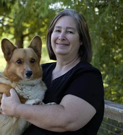 Dana with a Corgi at Stuebner Airline Veterinary Hospital Dana with a Corgi at Stuebner Airline Veterinary Hospital