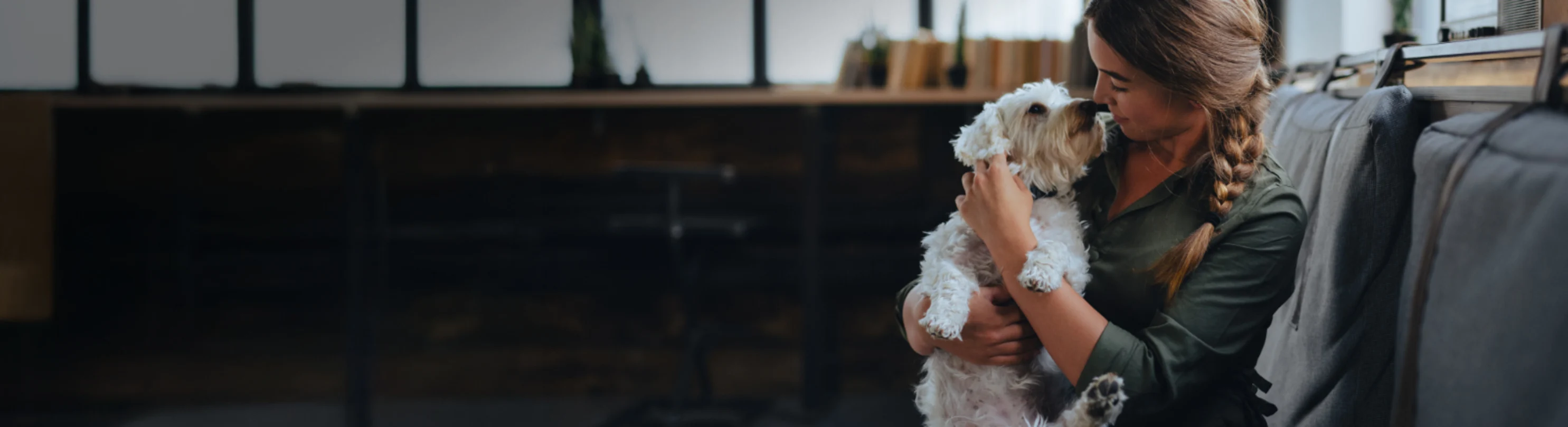 Girl Touching Noses with a White Dog Girl Touching Noses with a White Dog