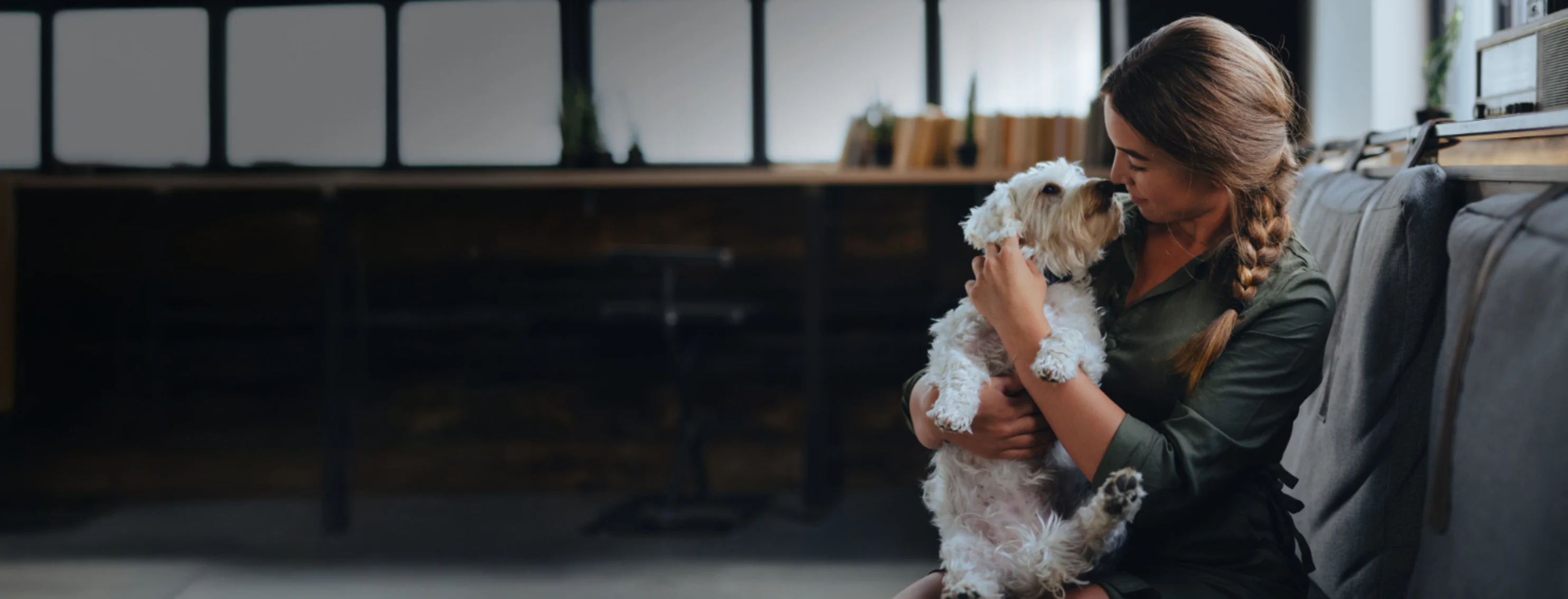 Girl Touching Noses with a White Dog Girl Touching Noses with a White Dog