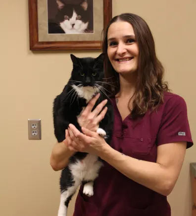 Becca at Dunes Animal Hospital, with black and white cat
