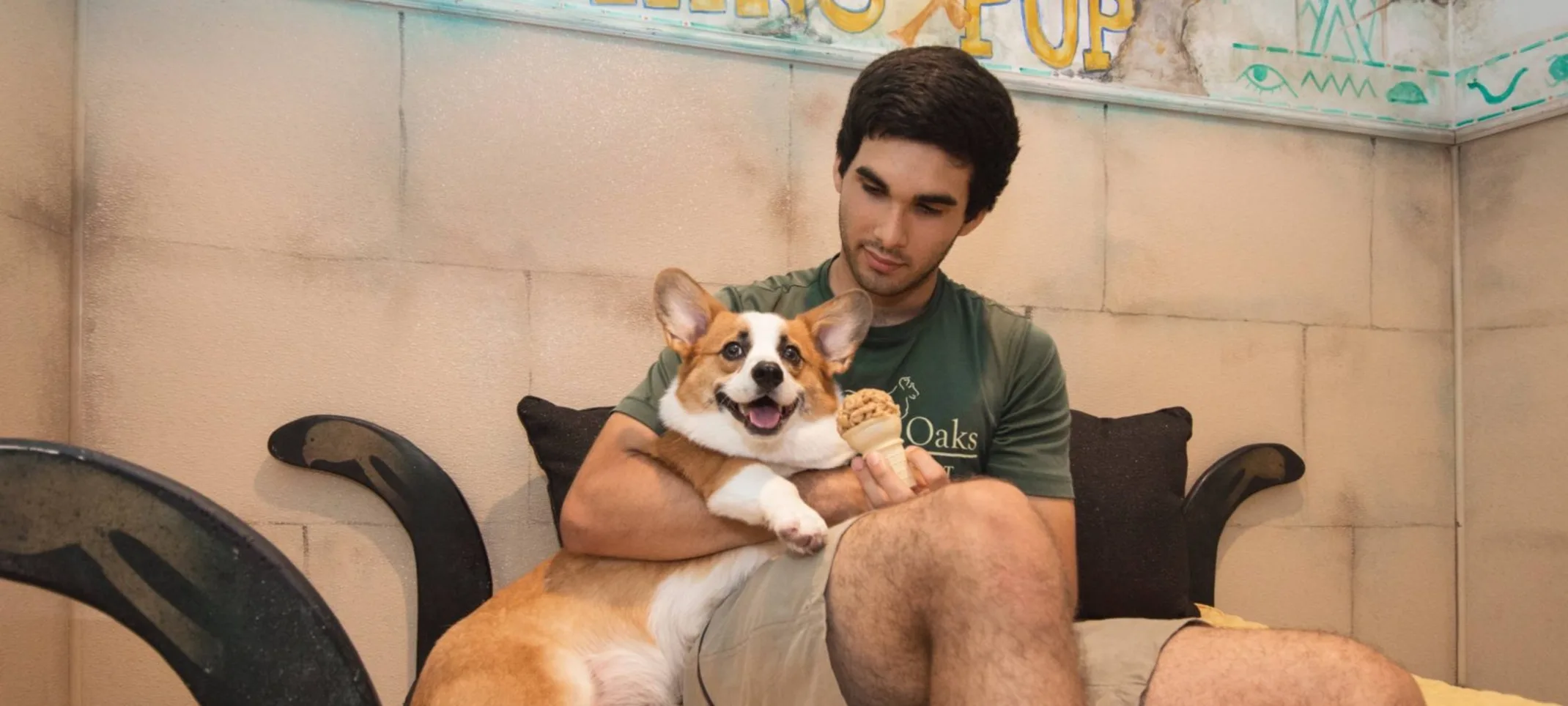 Staff reading to dog at Rover Oaks Pet Resort Staff reading to dog at Rover Oaks Pet Resort