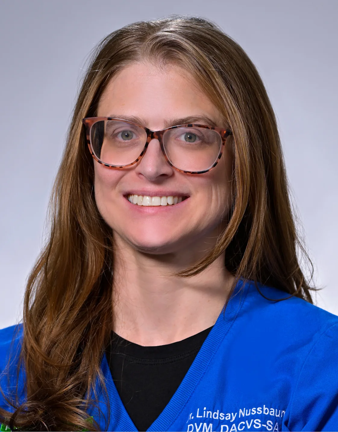 Lindsay Nussbaum smiling in front of the camera Lindsay Nussbaum smiling in front of the camera