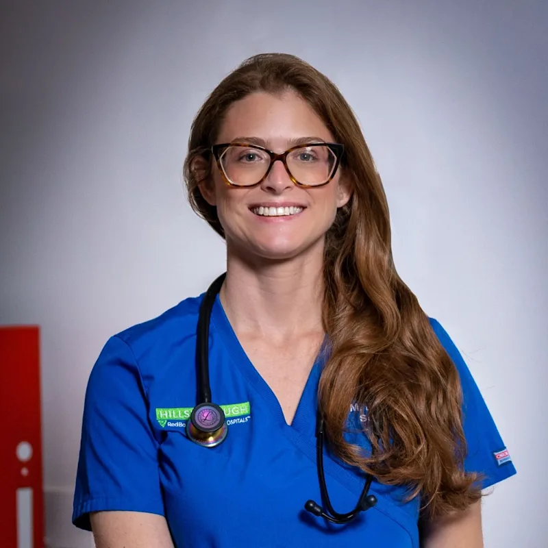 Lindsay Nussbaum smiling in front of the camera Lindsay Nussbaum smiling in front of the camera