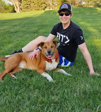 Terri's staff photo from Heather Ridge Pet Hospital's where she is on a hiking trail with her dog. Terri's staff photo from Heather Ridge Pet Hospital's where she is on a hiking trail with her dog.