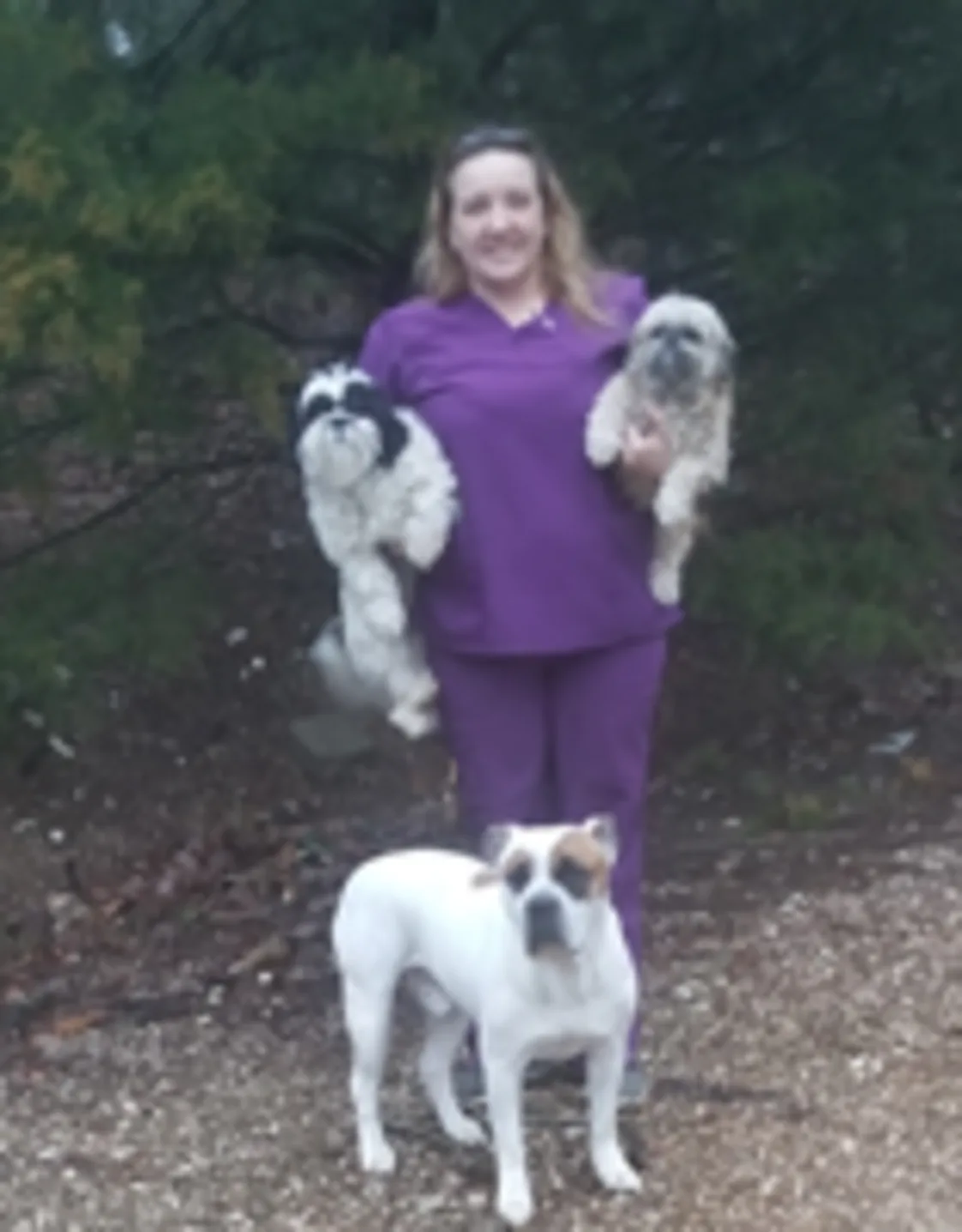 Nichole Gomez with three dogs Nichole Gomez with three dogs