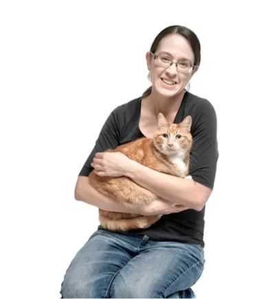 A portrait photo of RVT Amanda and their cat A portrait photo of RVT Amanda and their cat