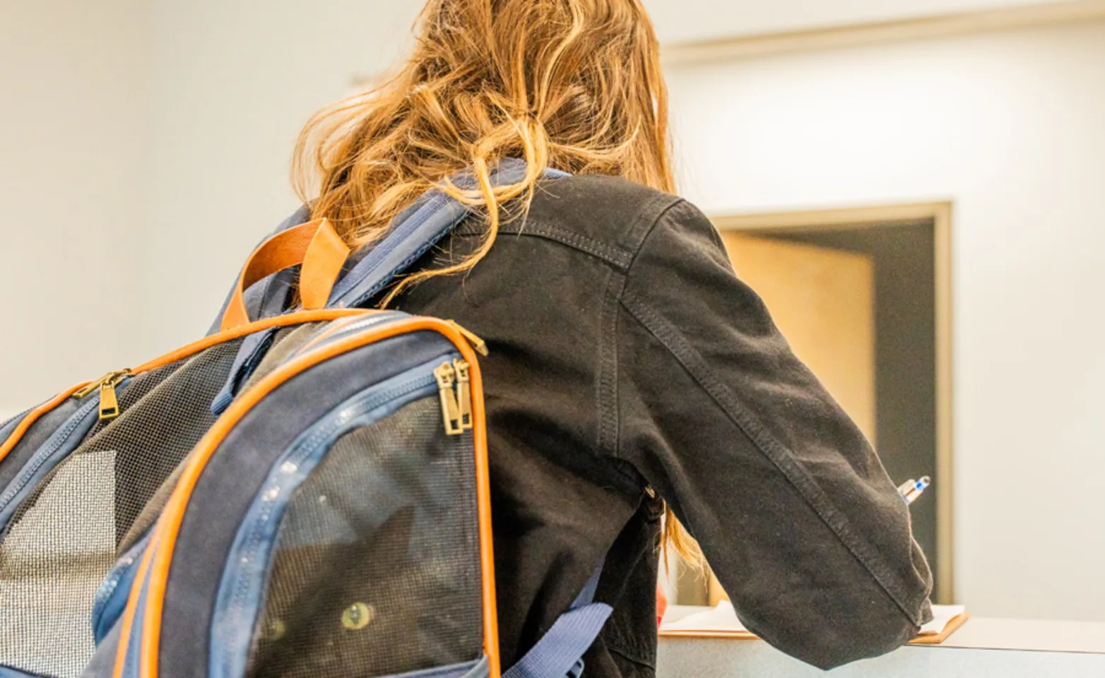 Guest waiting at AECC front desk Guest waiting at AECC front desk