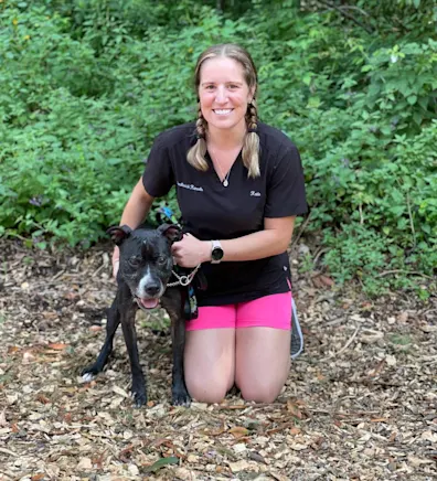 Katie with a dog. Katie with a dog.