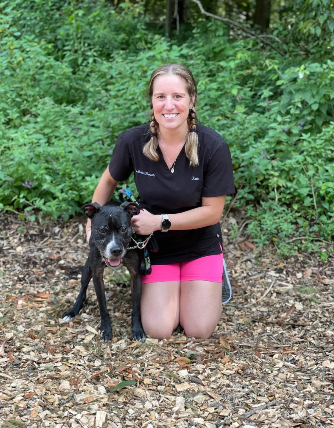 Katie with a dog. Katie with a dog.