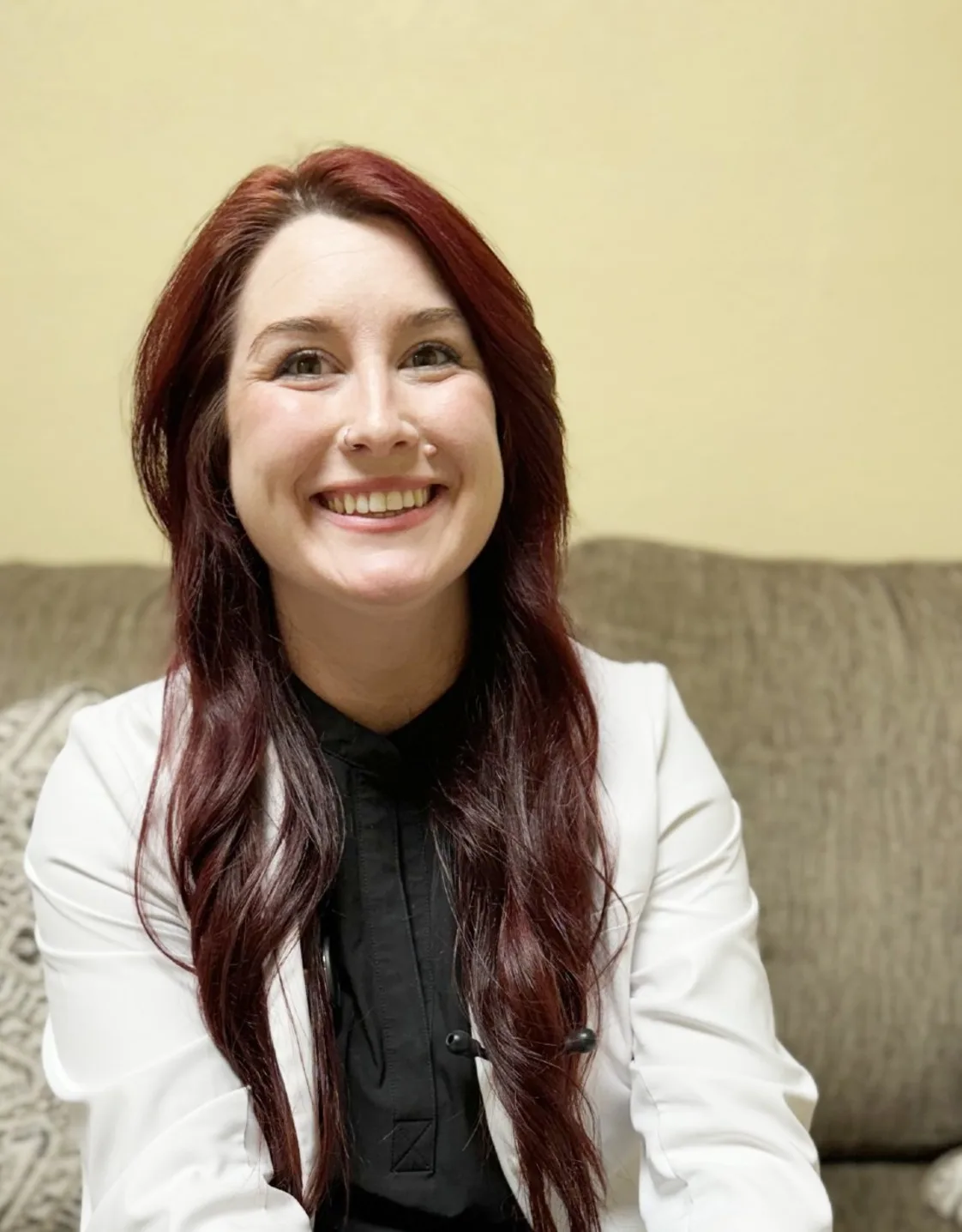 Dr. Snow sitting on a couch Dr. Snow sitting on a couch