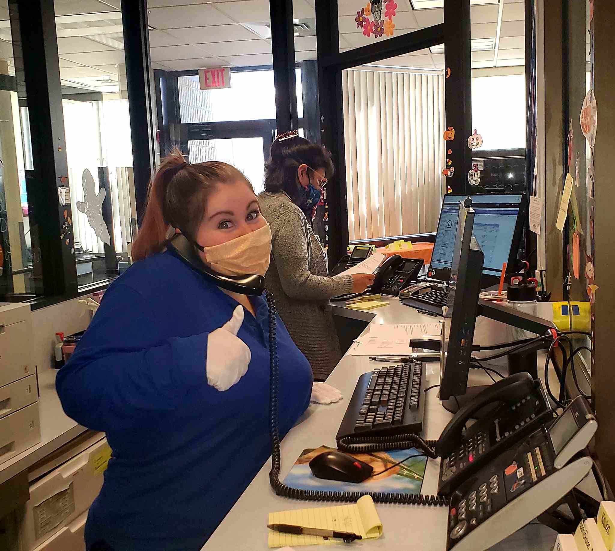 Receptionists at desk at Westbridge Veterinary Referral Hospital