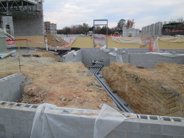 The foundation of VVC Short Pump showing dirt and pipes