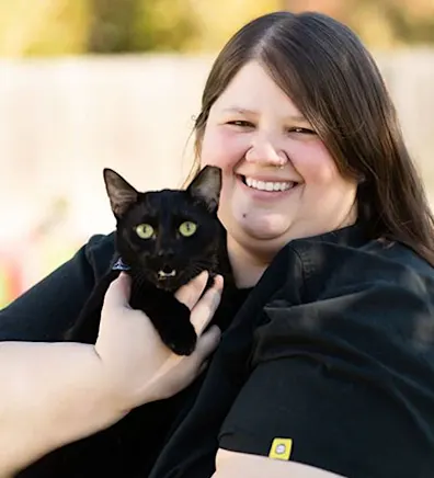 Jess holding black cat Jess holding black cat