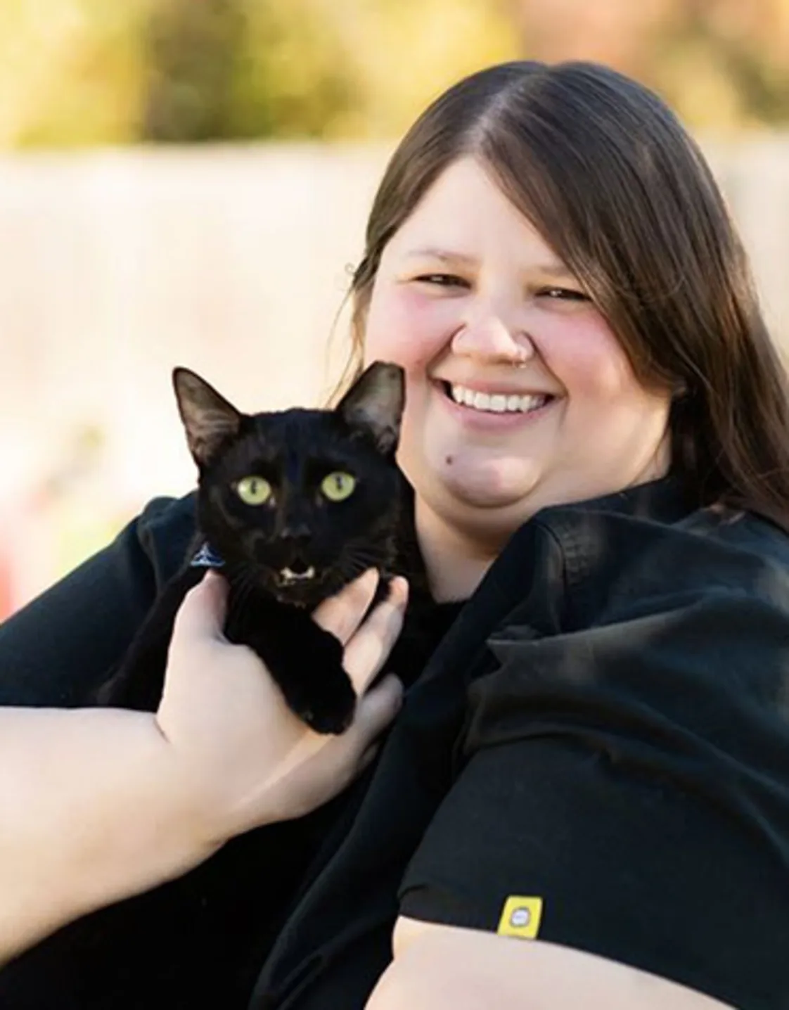 Jess holding black cat Jess holding black cat