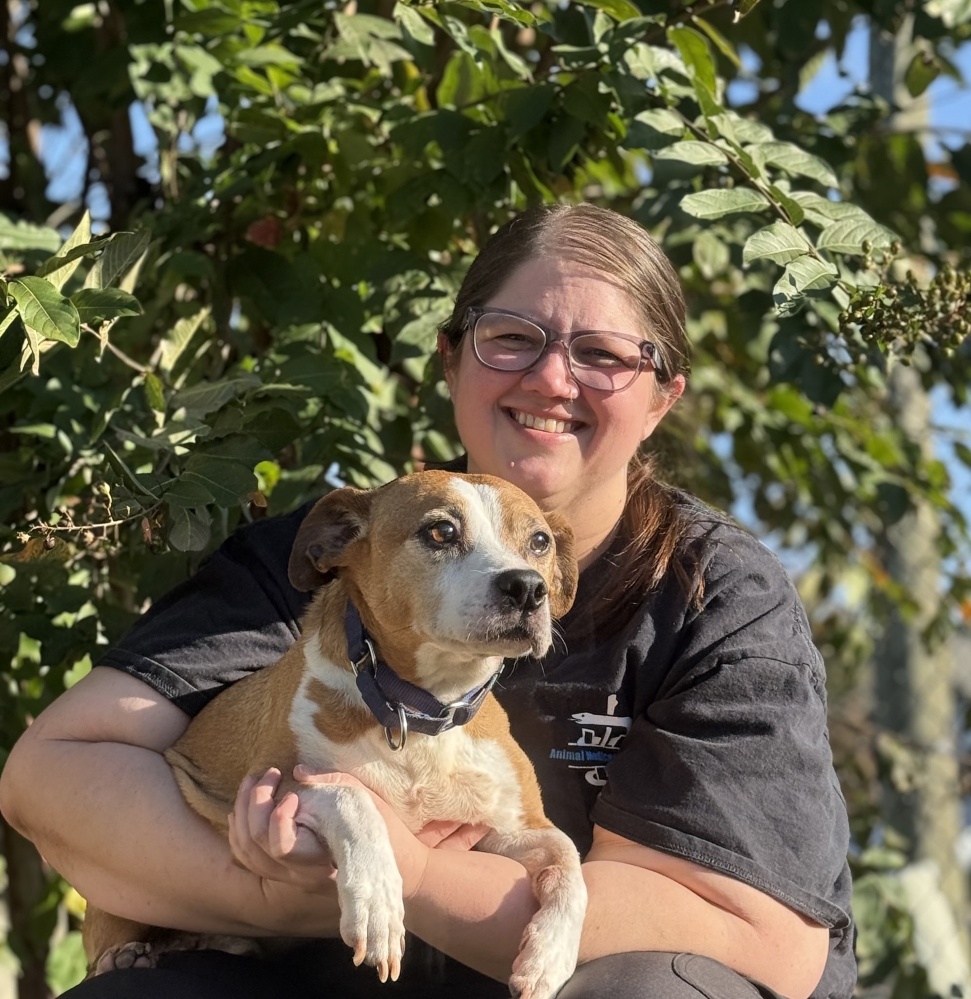 Jess holding black cat