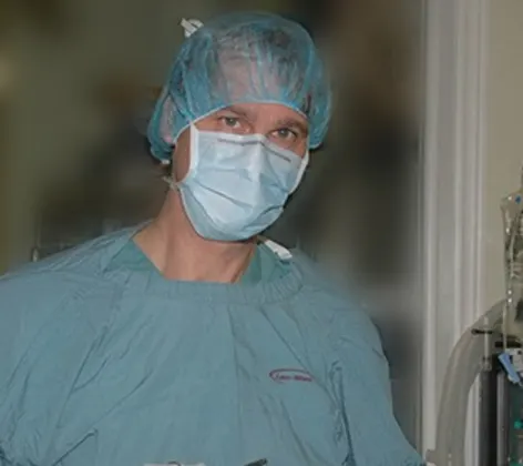 Doctor performing soft tissue surgery Doctor performing soft tissue surgery
