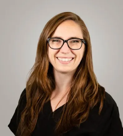 A photo of Dr. Sheehan smiling. A photo of Dr. Sheehan smiling.