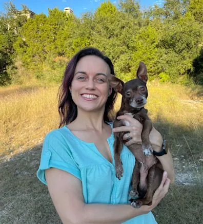 A photo of Practice Manager Jenn with her dog, Soto