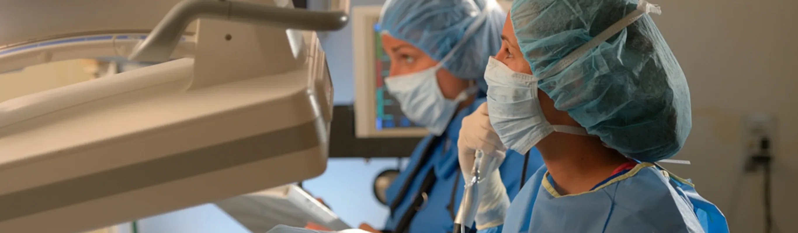 Veterinarians undergoing interventional radiology Veterinarians undergoing interventional radiology