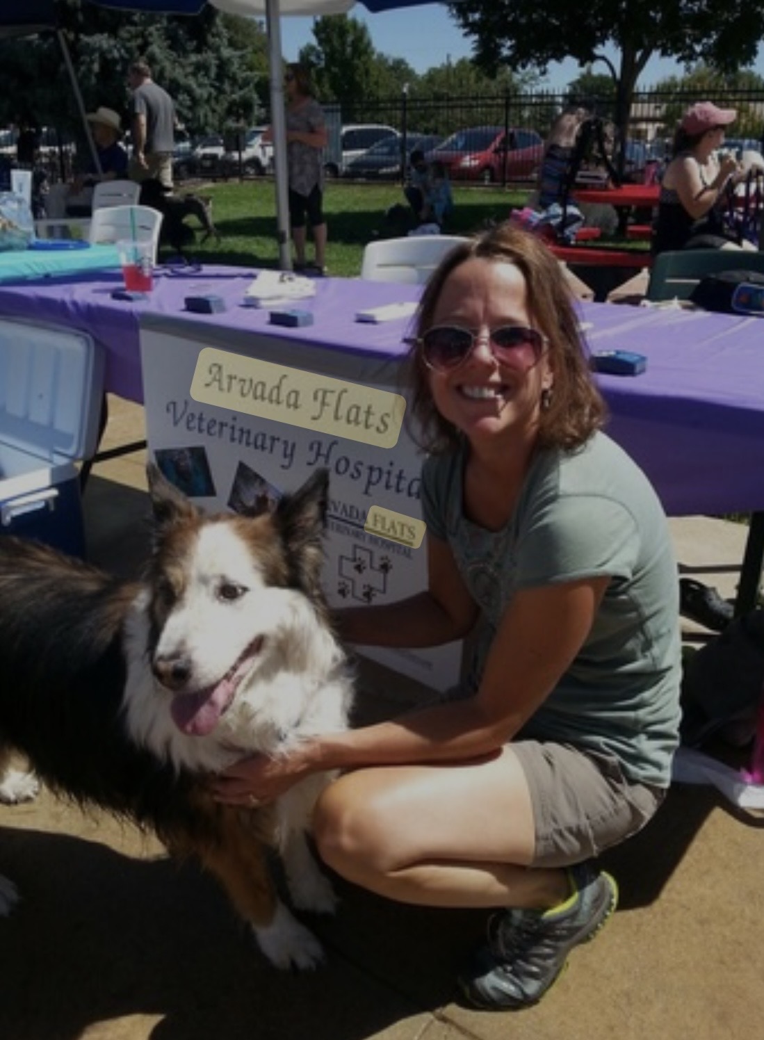 Woman and dog at the Arvada flats veterinary hospital event