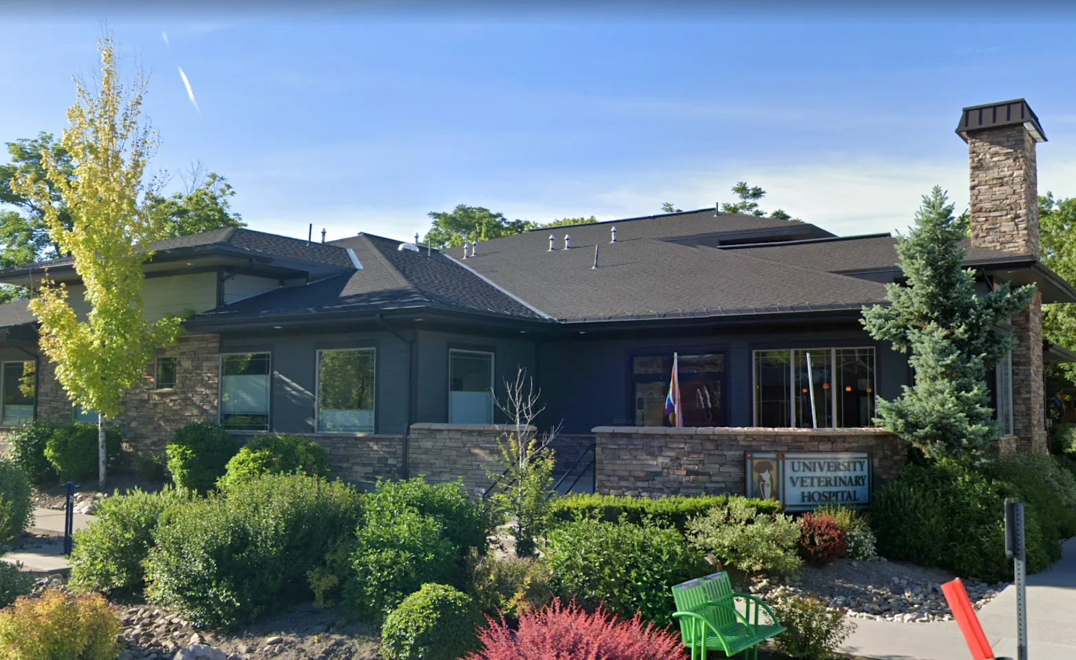 University Veterinary Hospital & Diagnostic Center's Front Building that is covered up with trees