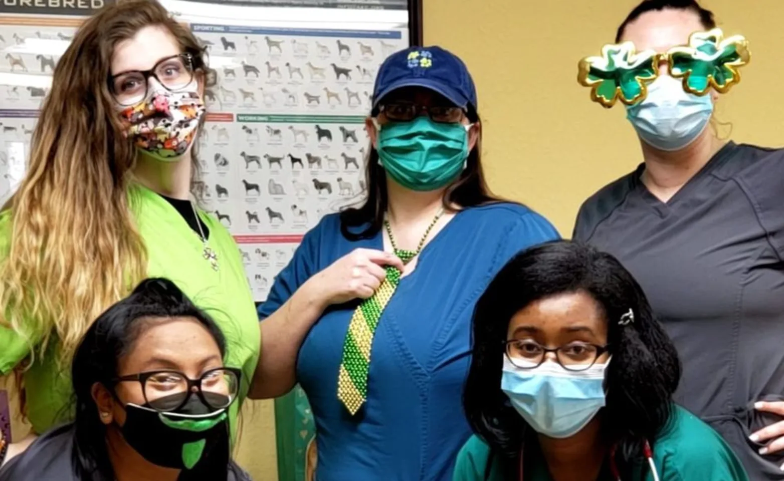 Group photo of staff members celebrating St. Patrick's Day