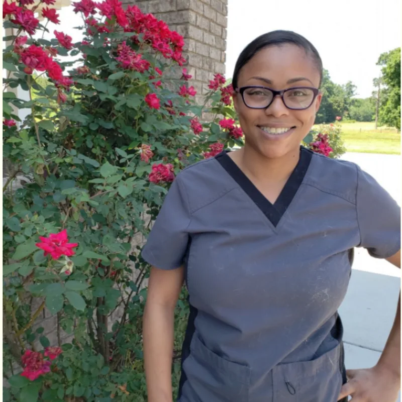 Denise smiling in front of camera Denise smiling in front of camera