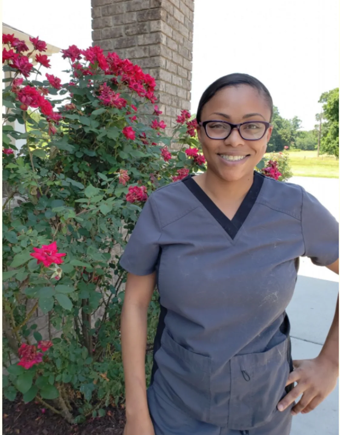 Denise smiling in front of camera Denise smiling in front of camera