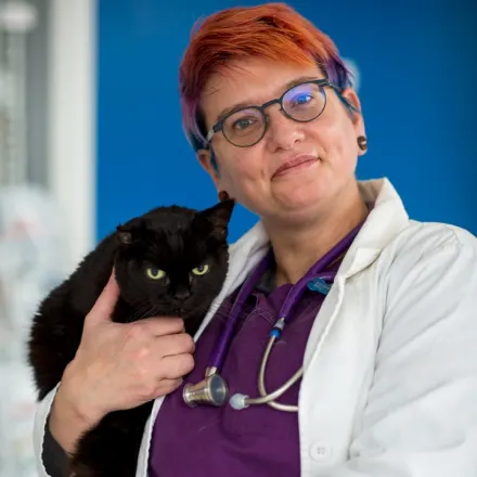 Dr. Elizabeth Hughs with black cat at at Tacoma Animal Hospital