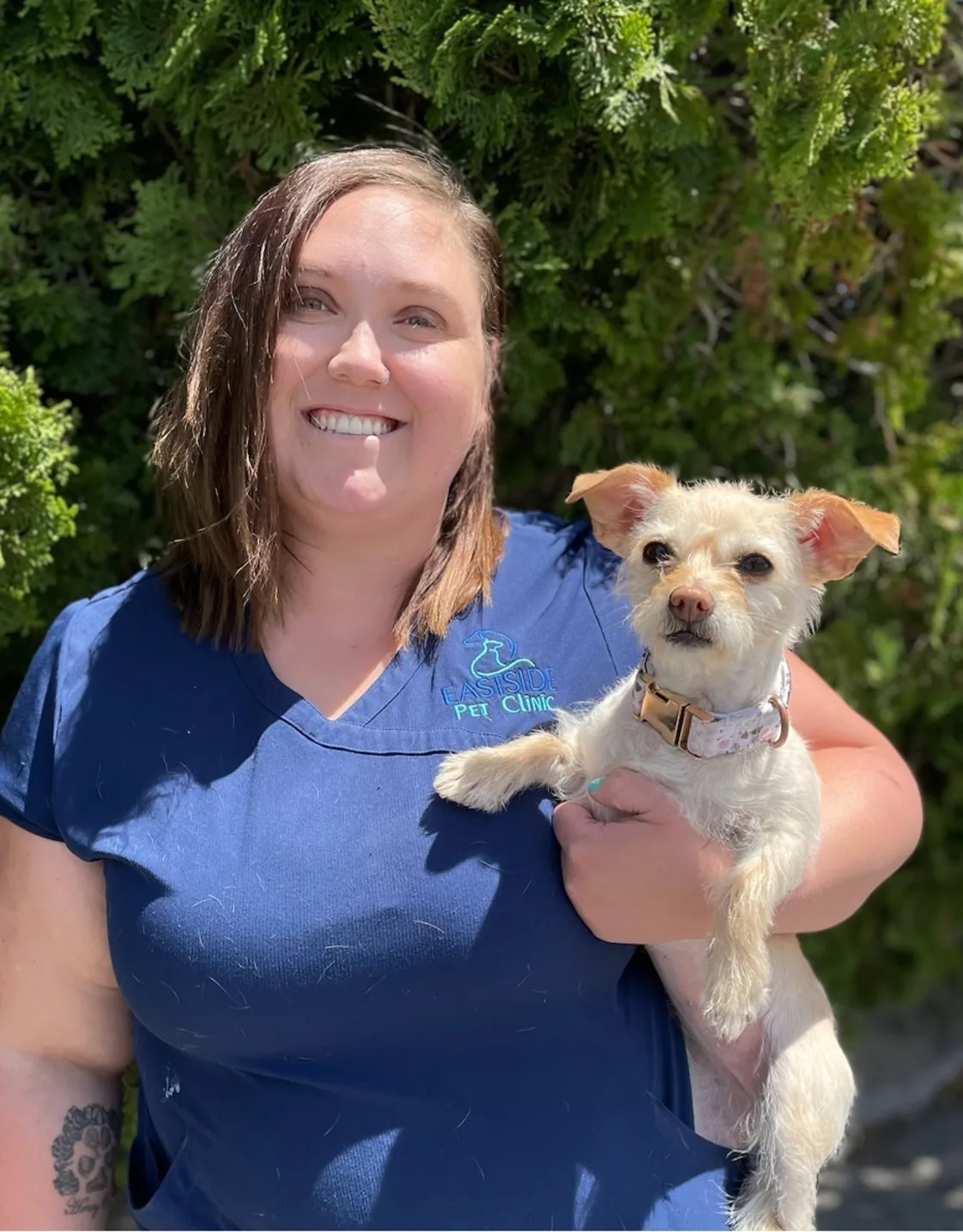 Madison smiling in front of the Eastside sign Madison smiling in front of the Eastside sign