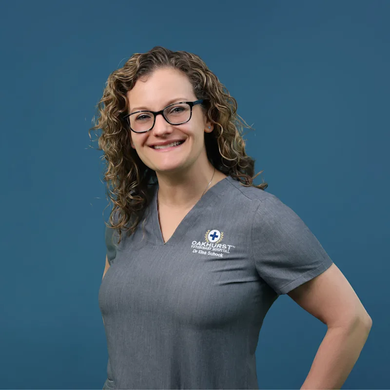 Dr. Elsa Schock posing with a cat Dr. Elsa Schock posing with a cat