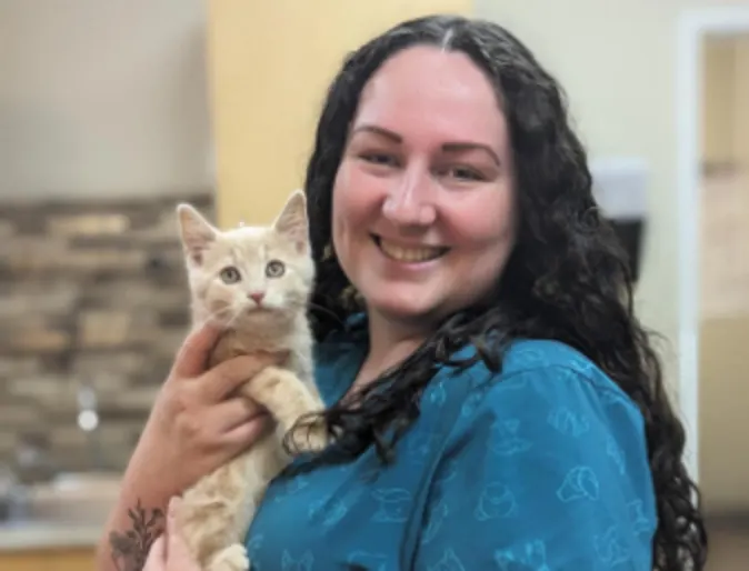 Staff with kitten Staff with kitten