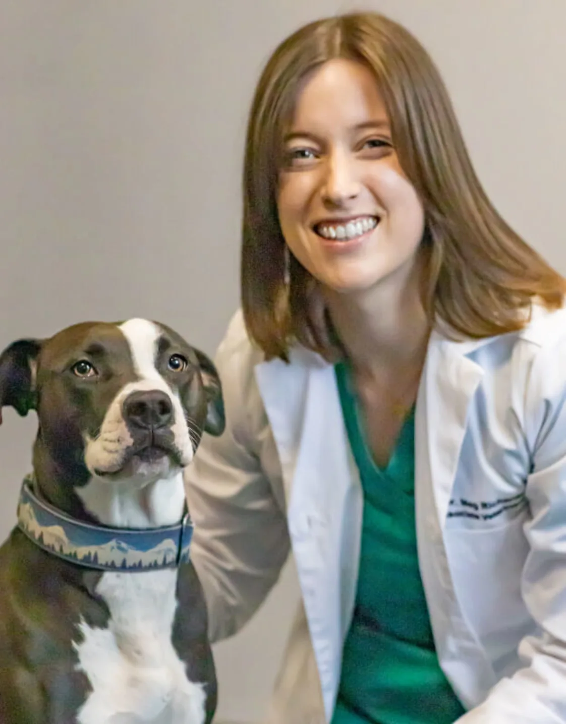 Photo of Margaret Richards w/black & white dog Photo of Margaret Richards w/black & white dog