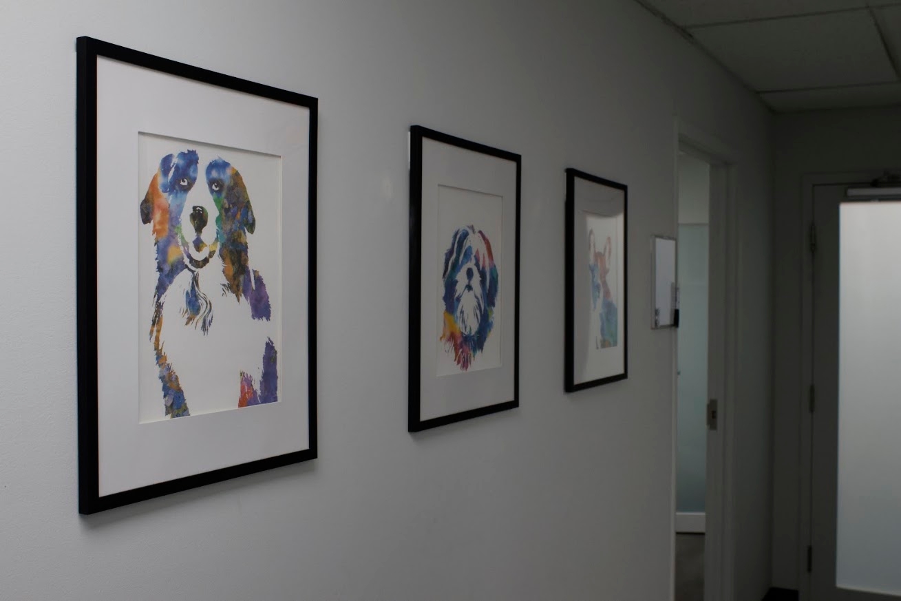 Four frames featuring watercolor dogs.
