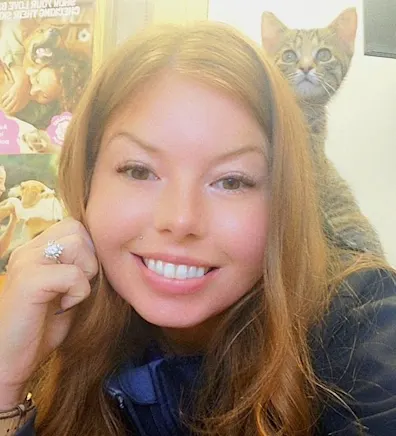 A collage of Corey and three black cats A collage of Corey and three black cats