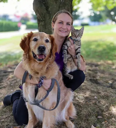 Christina holding a daschund Christina holding a daschund