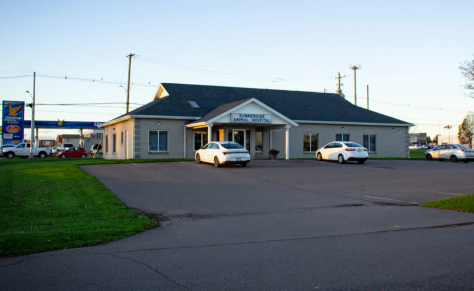 Photo of hospital exterior and parking lot Photo of hospital exterior and parking lot
