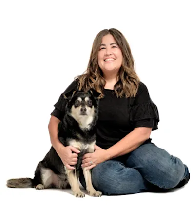 A portrait photo of Client Care Specialist Jen with her dog A portrait photo of Client Care Specialist Jen with her dog