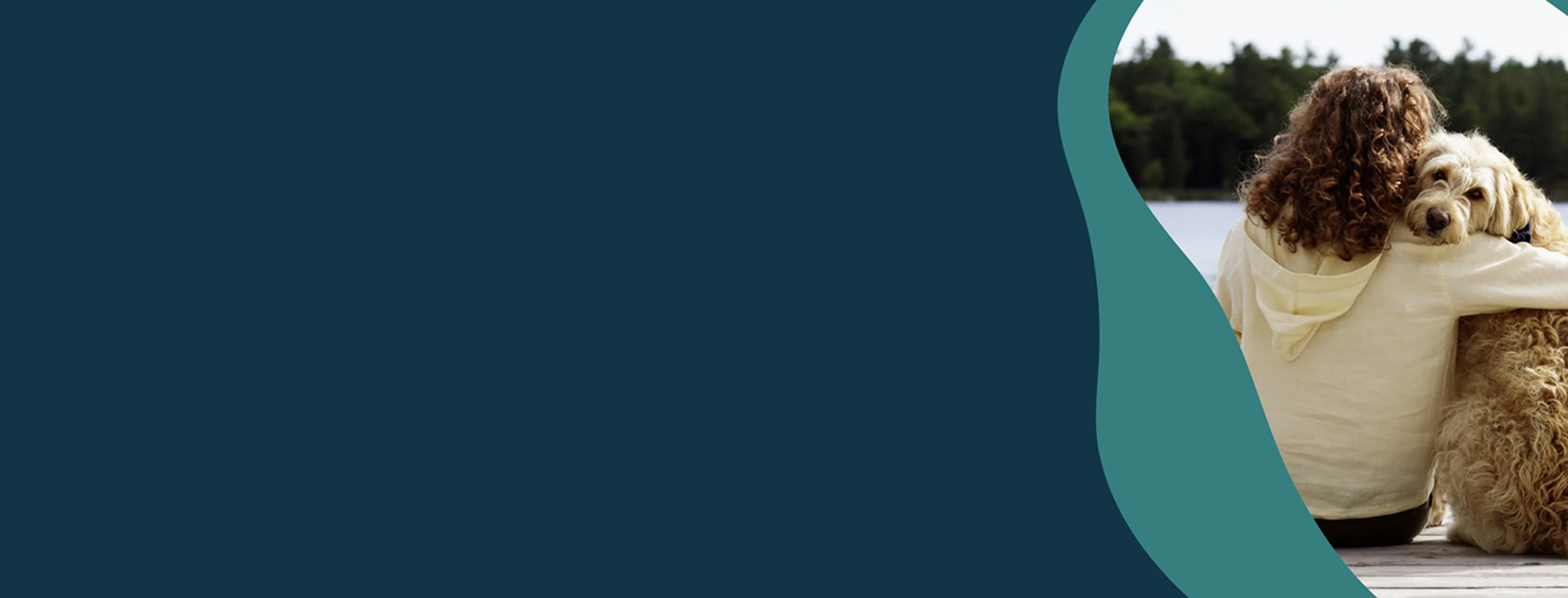 Woman sitting outside with arm around a dog Woman sitting outside with arm around a dog