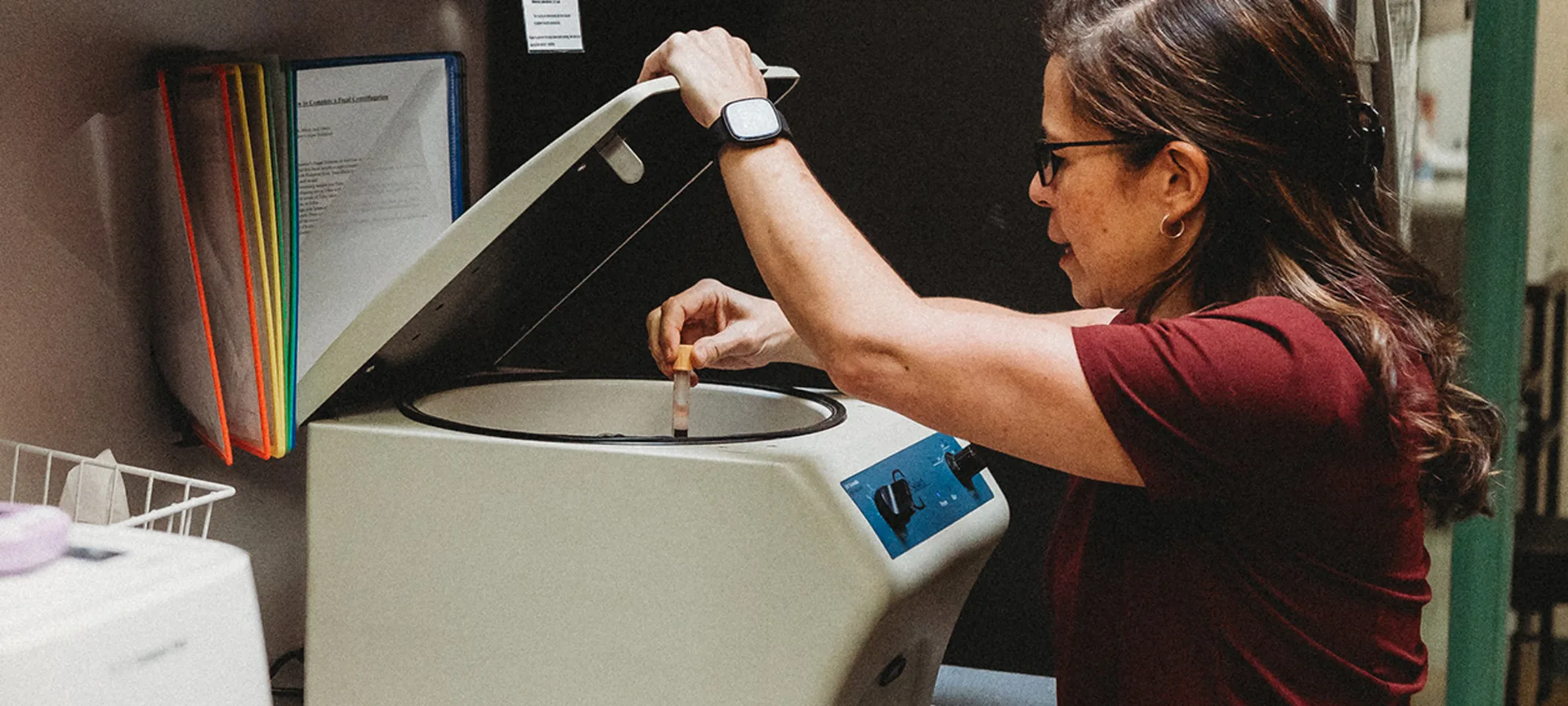 A technician using laboratory equipment A technician using laboratory equipment