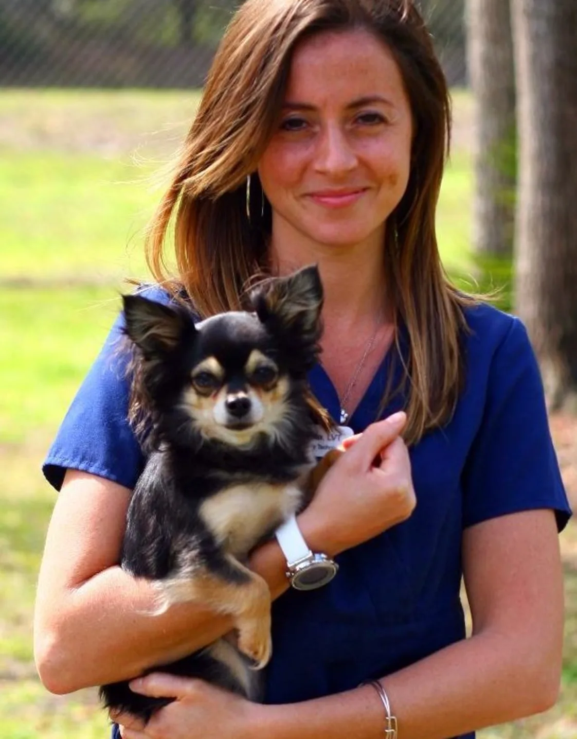 Jessica H. holding dog outside Jessica H. holding dog outside