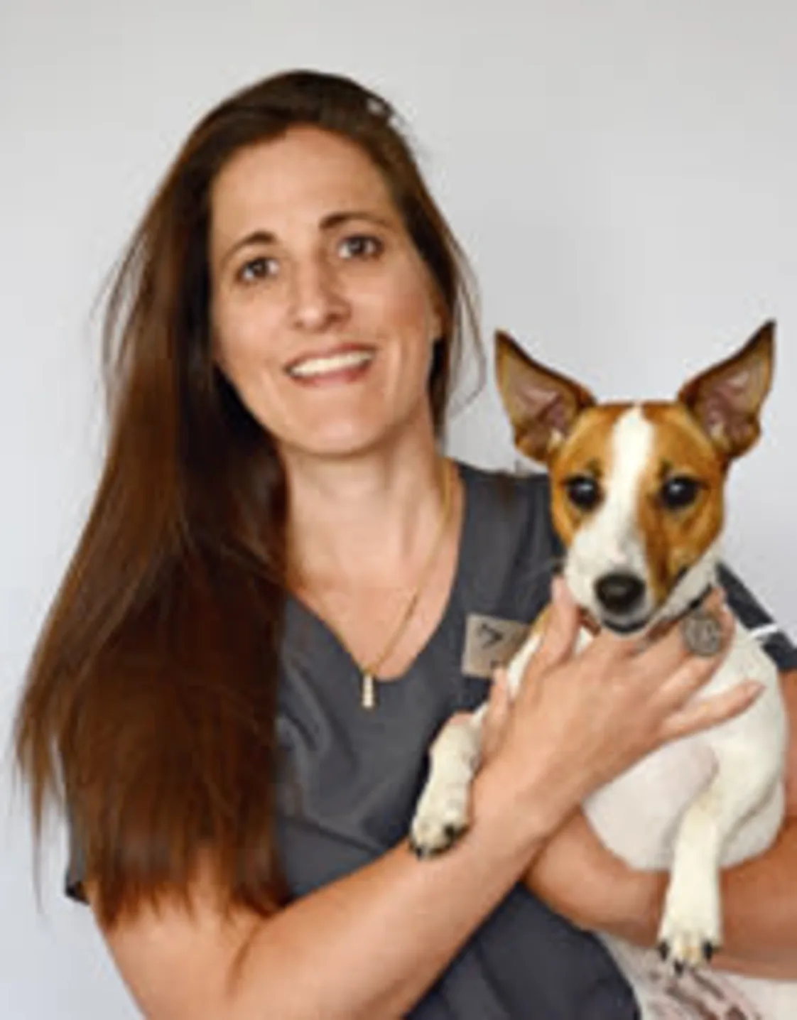 Dr. Dziak HOLDING A DOG Dr. Dziak HOLDING A DOG