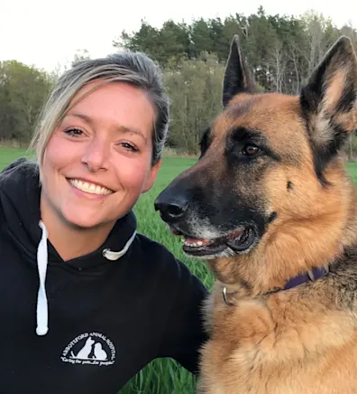 Charleen outside with german shepherd