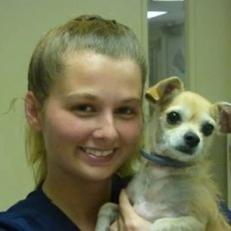 Camden holding a small dog Camden holding a small dog