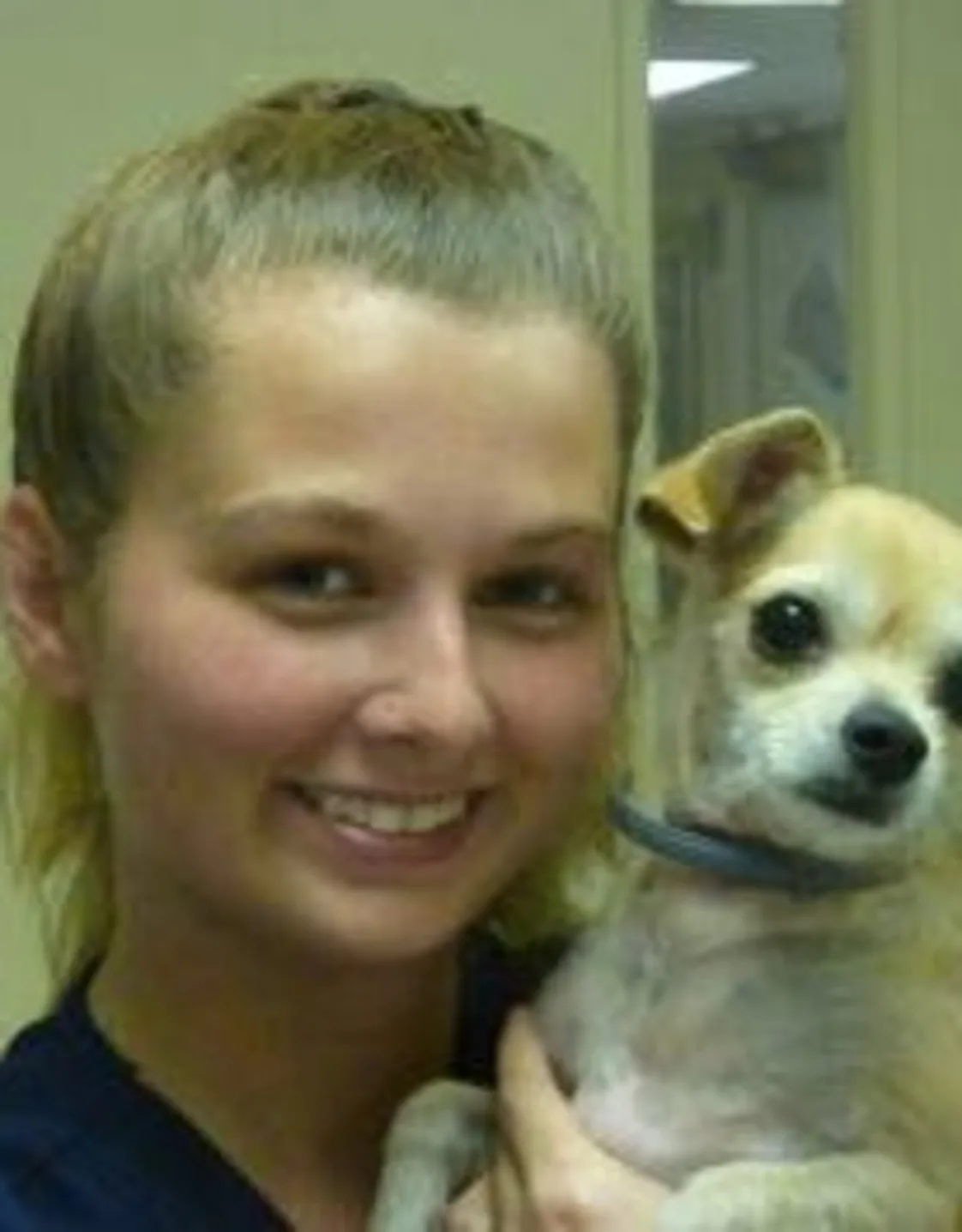 Camden holding a small dog Camden holding a small dog