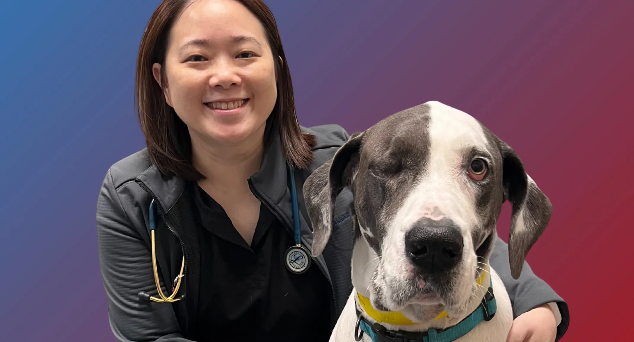 Dr. Young posing with a dog. Dr. Young posing with a dog.