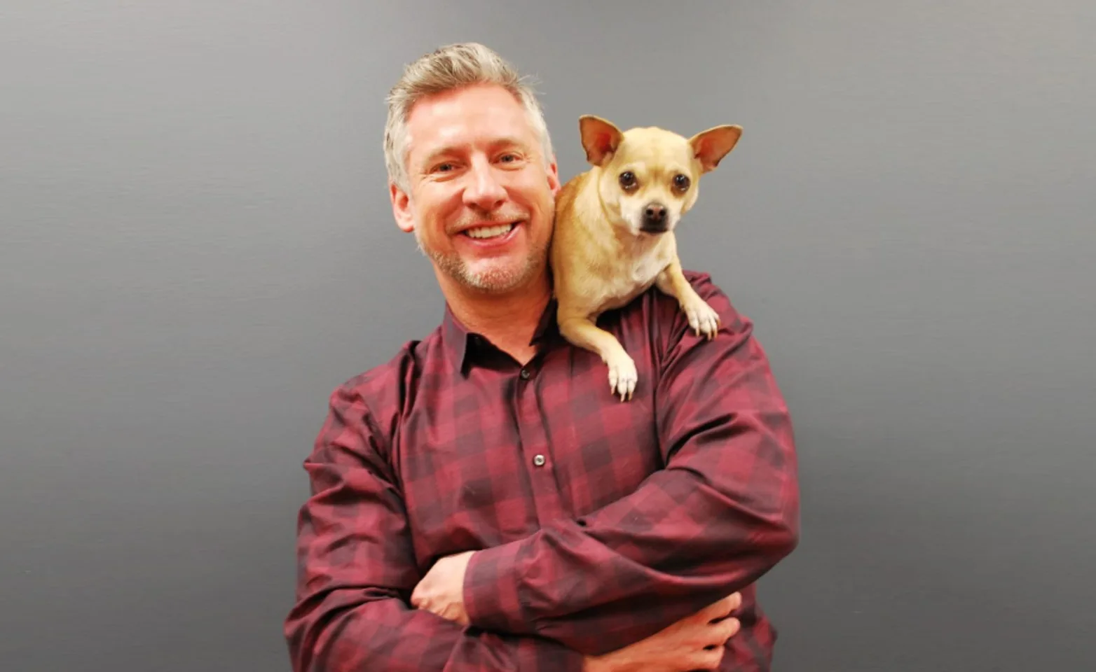 Dr. Tony Kremer at Old Town Animal Care Center with a small dog