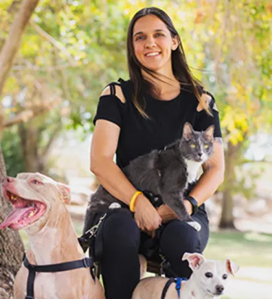 Angela Delano-Williams with a cat and two dogs Angela Delano-Williams with a cat and two dogs